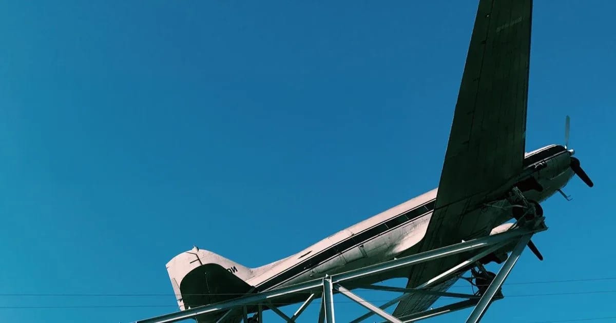 The vintage DC-3 airplane mounted on the roof of The Roasterie in Kansas City